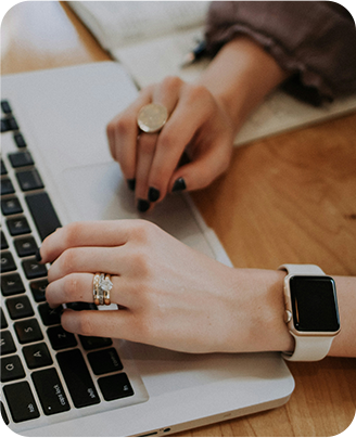 Woman typing on a computer